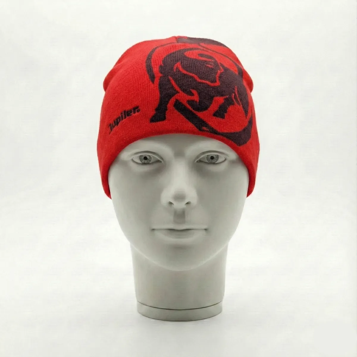 The Jupiler Red Beanie is a bold and cozy winter accessory designed for warmth and standout style.