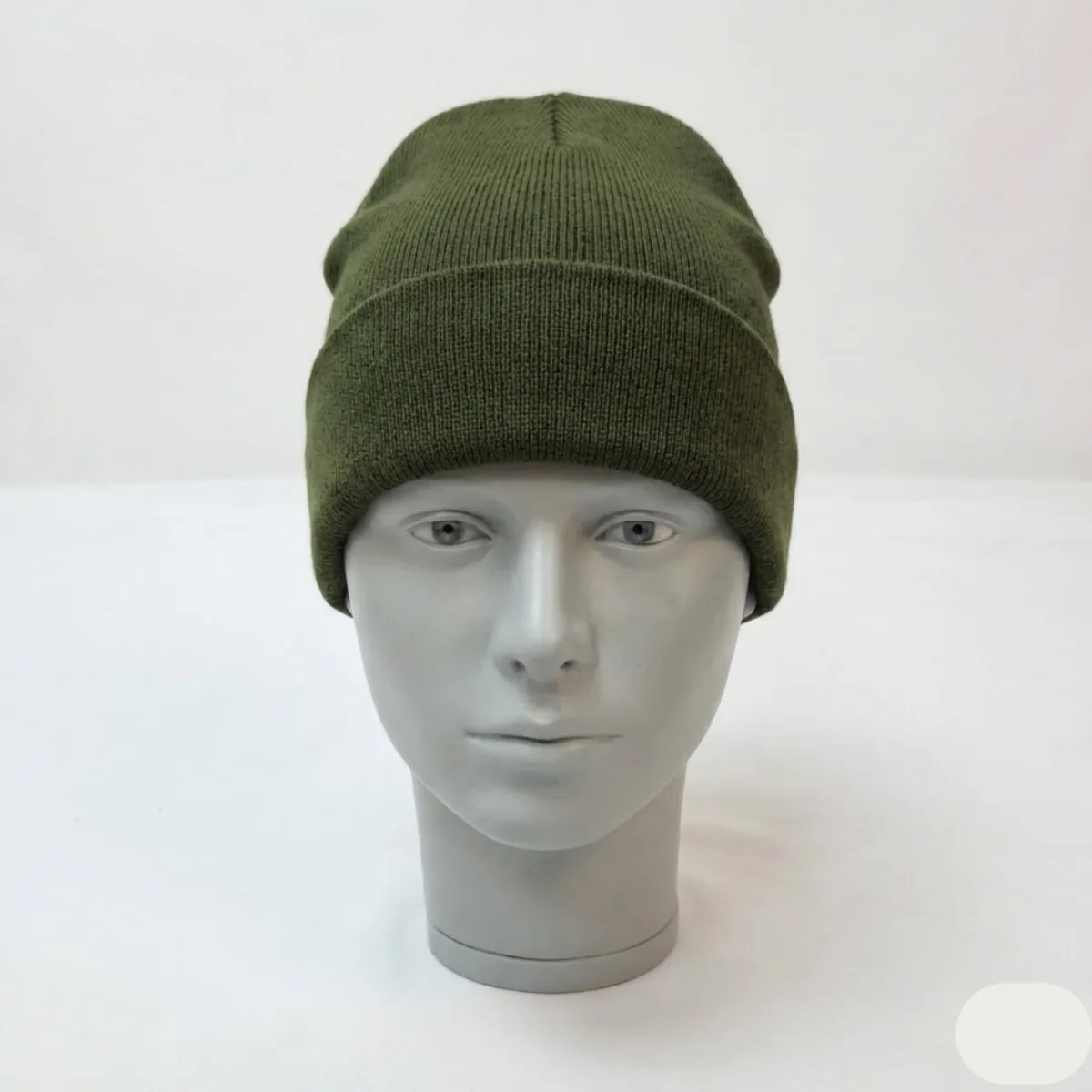 The Olive Green Beanie is a versatile and understated winter essential designed for warmth and comfort.
